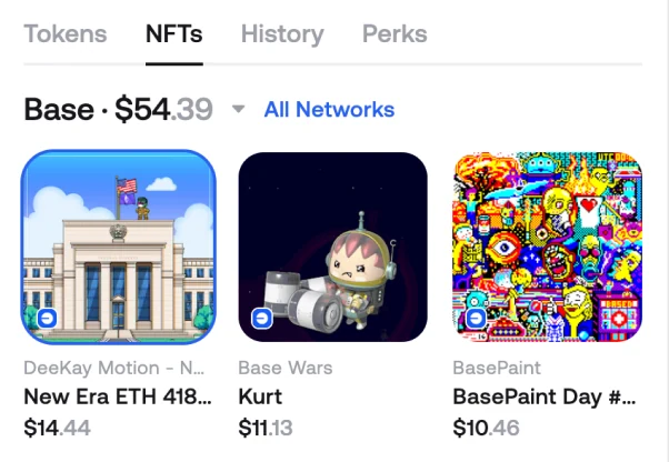 The NFTs tab in Zerion Wallet showing a grid of collectibles with their names and values
