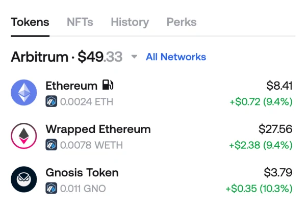 Zerion Wallet token list filtered to Arbitrum, showing ETH, wrapped ETH and other balances with 24-hour changes